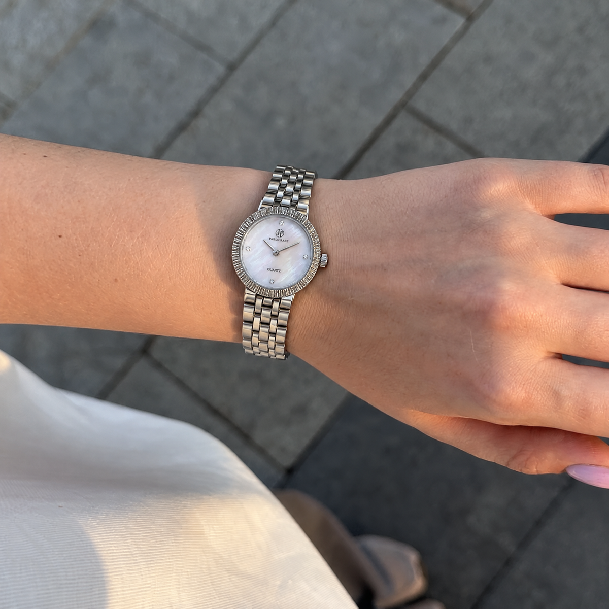 Chelsea 32mm steel women's watch with mother-of-pearl dial worn on the wrist