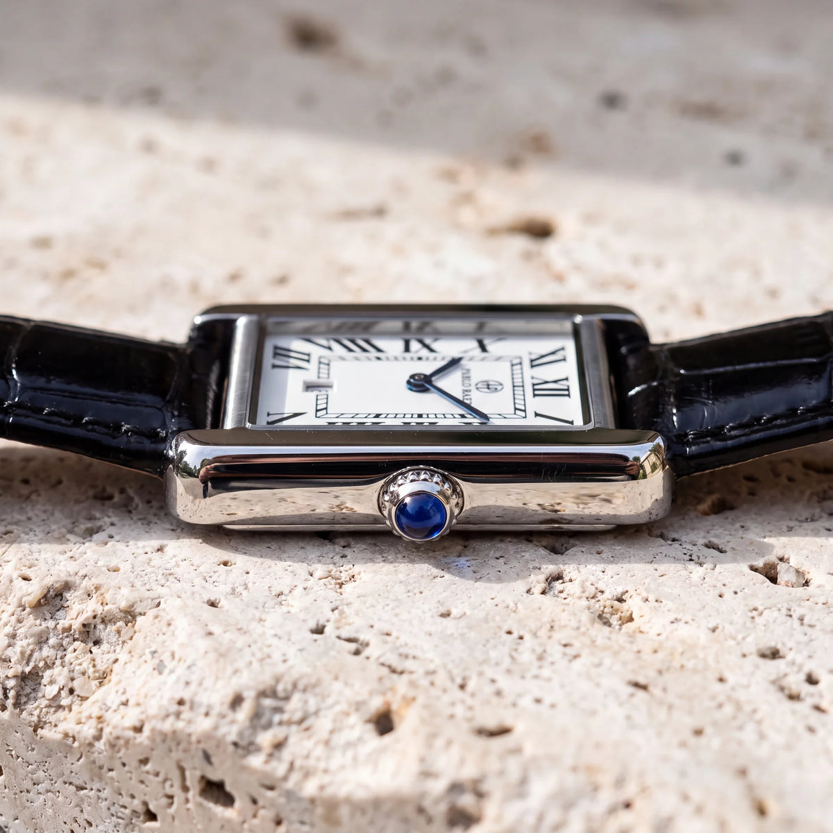 Houston Essence 28mm with black leather strap resting on stone #color_black